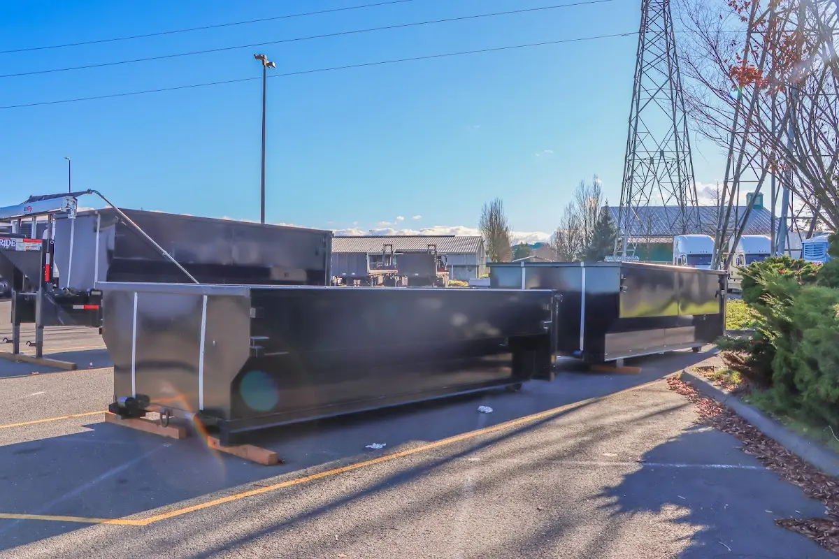Roll-off dumpster ready for waste disposal at job site for Concrete Dumpster Rental in Leavenworth
